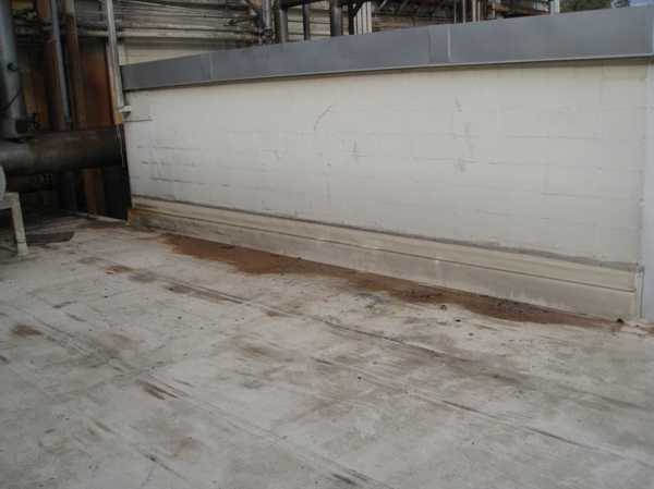 Ponding water at the tie-in due to a lack of secondary slope